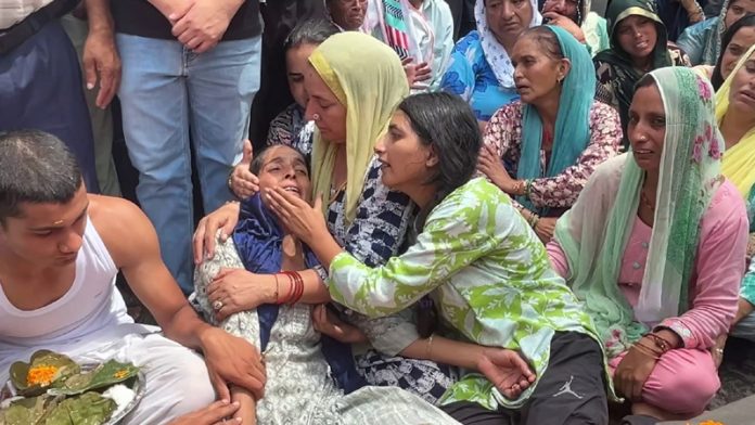 Wailing mother and sister of deceased Rajinder Kumar who was sole bread earner of the family.