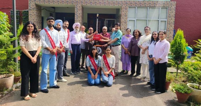 Faculty members of Govt College of Education posing along with the students during a function on Wednesday.