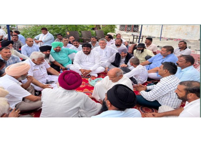 Senior NC leader Ajay Kumar Sadhotra and others during 10th Day ceremony of a Chashoti cloudburst victim in RS Pura, Jammu.