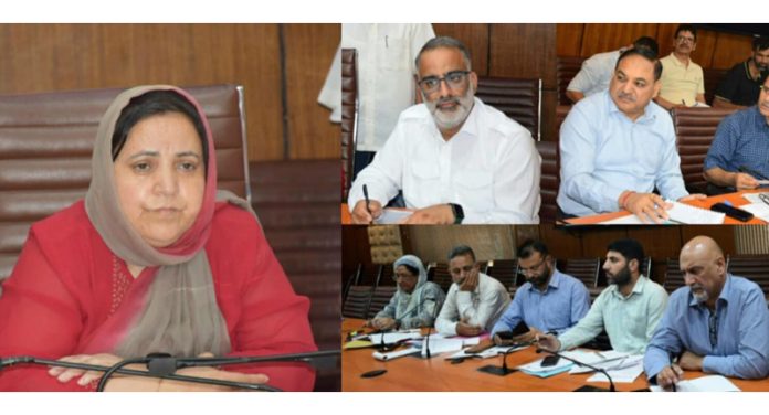 Sakeena Itoo chairing a meetingiin Srinagar.