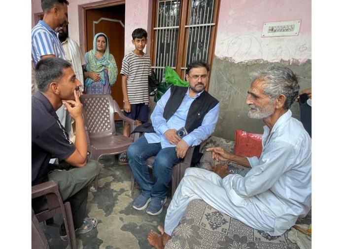 Minister Satish Sharma interacting with people in Khour.