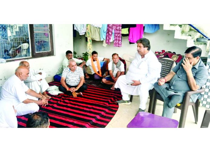 Raman Bhalla along with other party leaders during visit to families of the victims of Chashoti, Kishtwar tragedy on Sunday.