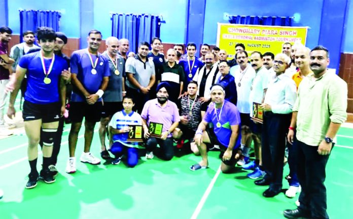 Winners posing along with medals during closing ceremony.