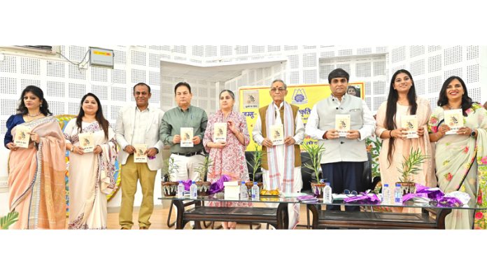Writers, poets and other dignitaries during a book release function at K L Saigal Hall, Jammu.