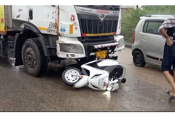 The ill fated scooty which was hit by a truck at Jatwal in Samba on Thursday.