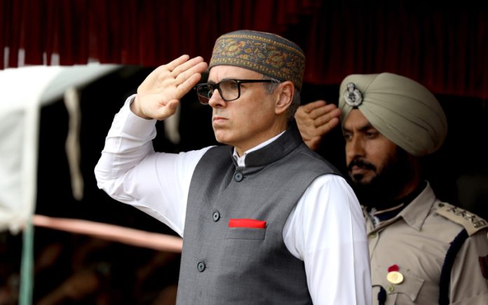 Chief Minister Omar Abdullah takes salute at Bakshi Stadium on the 79th Independence Day. -Excelsior/Shakeel