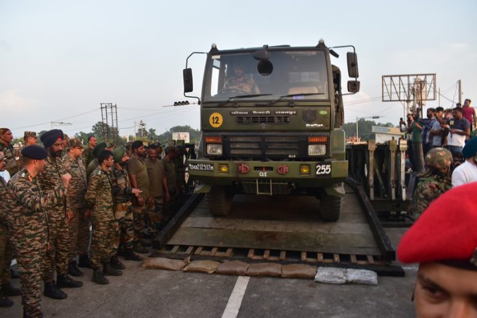 An Army vehicle crosses the bailey bridge built to restore the 4th Tawi bridge in Jammu. — Excelsior/Rakesh