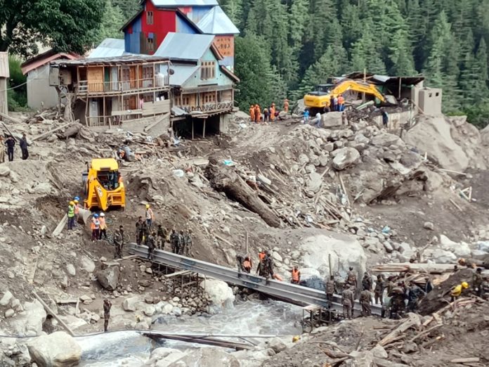 Army engineers raise temporary foot-bridge over Chashoti Nallah in Paddar.