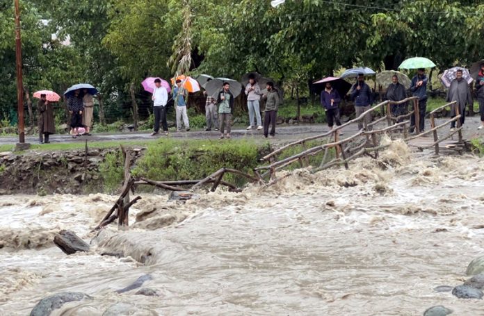 Water level has risen in Lidder river in Pahalgam due to heavy rains in Kashmir. -Excelsior/Sajad Dar
