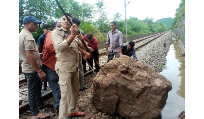 Rail track being cleared near Manwal in Jammu on Wednesday.