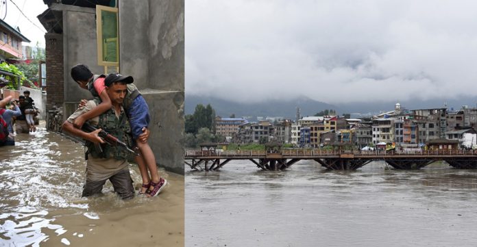 Water level in river Jhelum at Ram Munshi Bagh in Srinagar crosses alert mark amid continuous rainfall in the Valley. -Excelsior/Shakeel