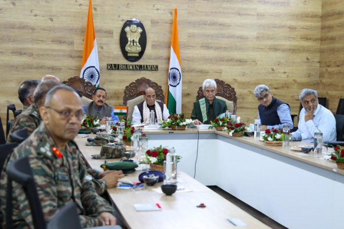 Defence Minister Rajnath Singh reviewing situation in cloudburst-hit Chashoti village of Kishtwar district, at Raj Bhawan Jammu on Sunday.