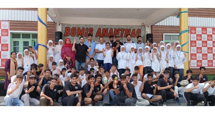 Players posing along with medals during closing ceremony at Anantnag. Players posing along with medals during closing ceremony at Anantnag.