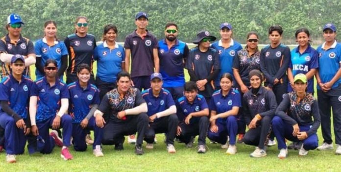 J&K Women team posing for a group photograph.