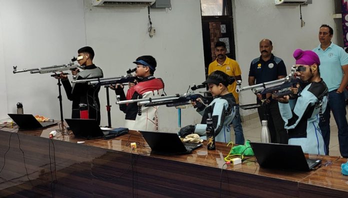 Shooters in action during championship. Shooters in action during championship.