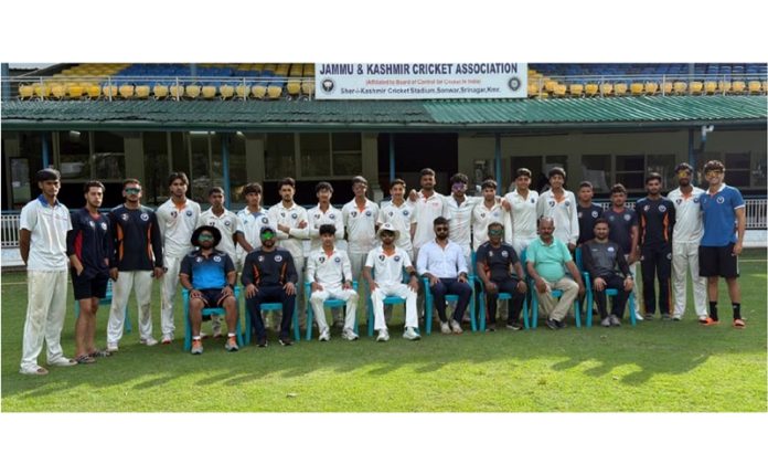 JKCA U-19 cricket team posing along with coaching staff.