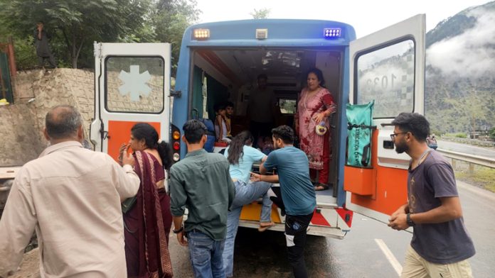Volunteers shifting accident victims to a hospital in Ramban on Tuesday. -Excelsior/Parvez Mir