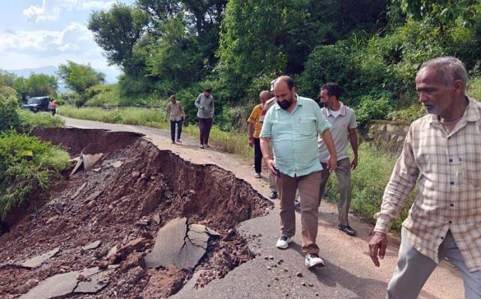 MLA Basohli, Darshan Singh during visit to flood hit areas on of his constituency on Thursday. -Excelsior/Pardeep MLA Basohli, Darshan Singh during visit to flood hit areas on of his constituency on Thursday. -Excelsior/Pardeep