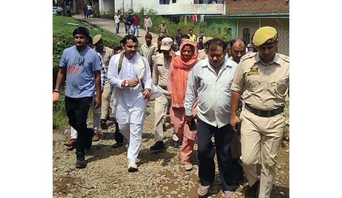 MLA Ranbir Singh Pathania during a tour of flood hit areas of his constituency in Udhampur on Thursday.