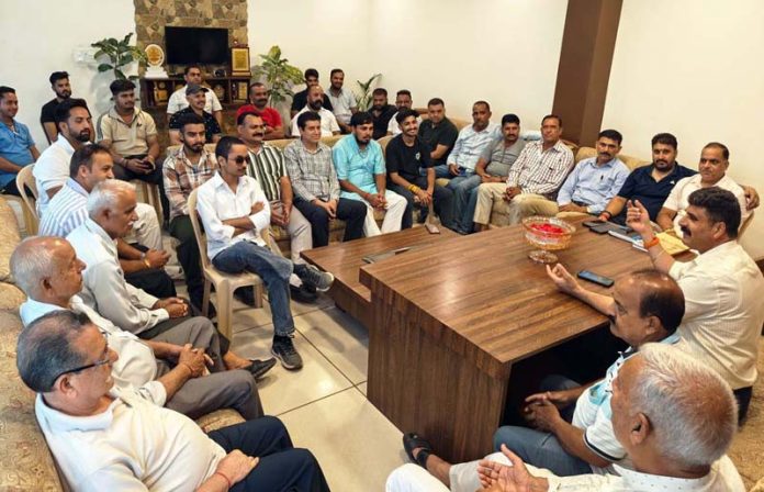 Senior political leader, Pawan Khajuria addressing a meeting at Sailan Talab, Udhampur on Friday.