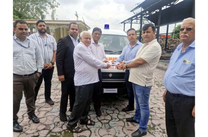 Trustees of MC Chopra Charitable Trust donating an ambulance to Channi Himmat Cremation Ground.