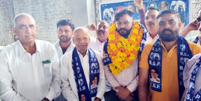 New entrants being welcomed in BSP by senior party leaders at Khour.