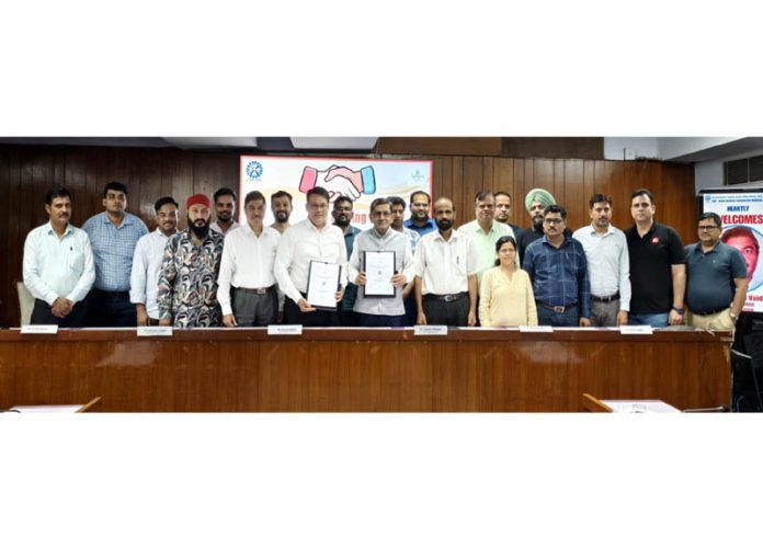 Director CSIR-IIIM Jammu Dr Zabeer Ahmed, Director of Mehta Ayurvedic Sansthan Gaurav Mehta and others during signing of an MoU.