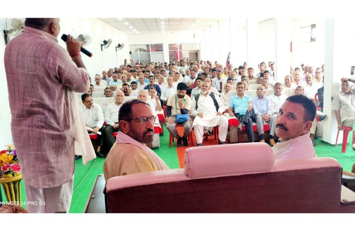 Former Minister Dr Manohar Lal at public meeting in Mandli area of Billawar.