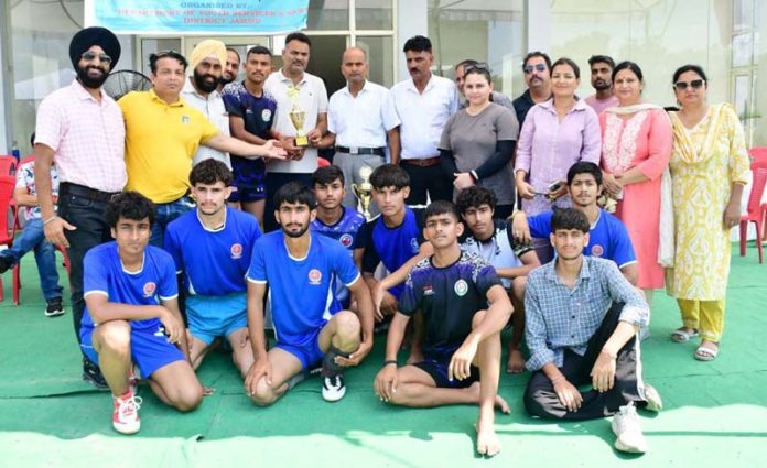 Winning team posing along with dignitaries. Winning team posing along with dignitaries.