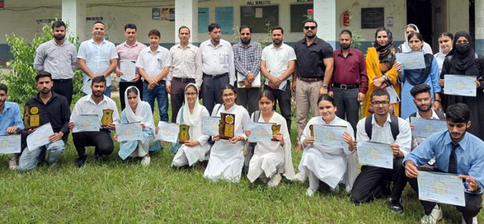 Students of GDC Rajouri posing along with certificates.