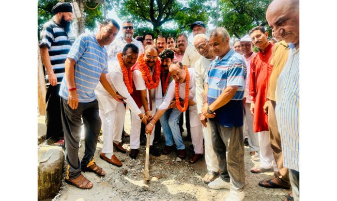 MLA Bahu Ch Vikram Randhawa kick starting construction of drain at Cantonment area, Jammu on Tuesday.