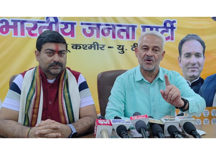 BJP spokesperson Arun Gupta and media incharge, Dr Pardeep Mangotra at a press conference at Jammu on Monday.