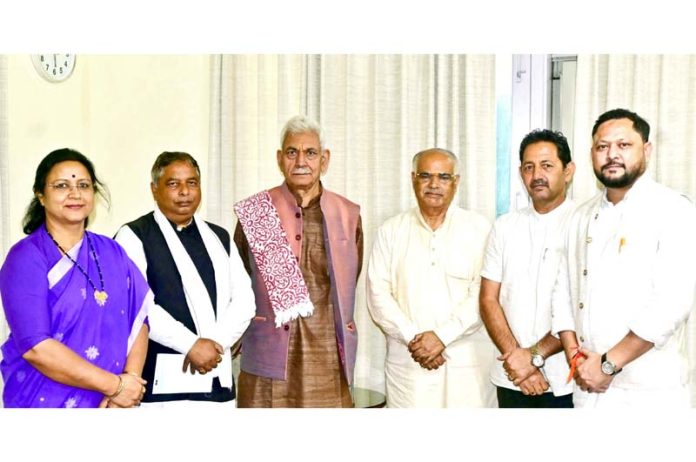 A delegation of BJP leaders meeting LG on Sunday.