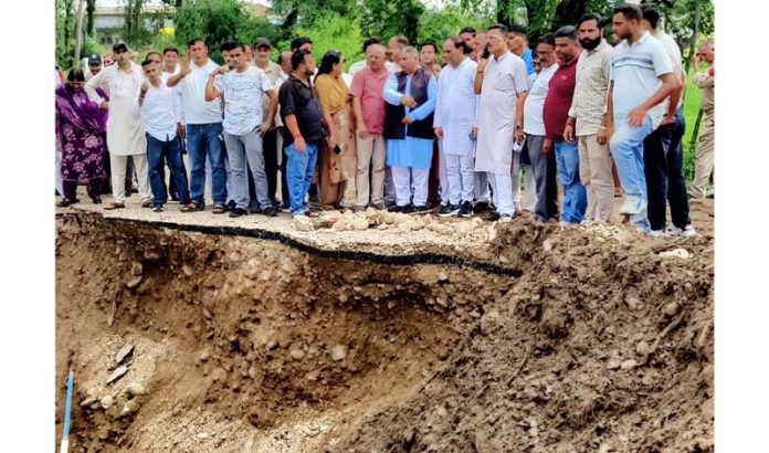 BJP leaders assessing damages caused by flash floods in Ramgarh on Thursday.