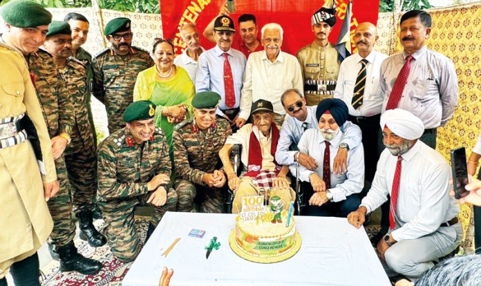 Tiger Division officers celebrating 100th birthday of Lt Col SDS Jamwal in Jammu on Wednesday.