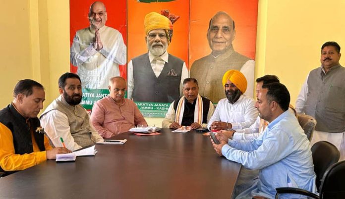 Sat Sharma conducting an organizational meeting in Poonch on Tuesday.