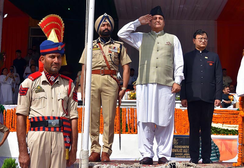 Minister Javid Dar saluting Tricolour at Baramulla.