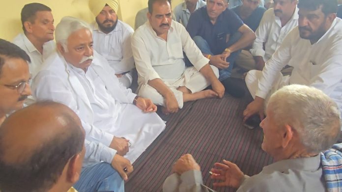 Senior NC leader Ajay Kumar Sadhotra and others meeting with a cloud-burst hit family in Ghati area of Kathua. Senior NC leader Ajay Kumar Sadhotra and others meeting with a cloud-burst hit family in Ghati area of Kathua.