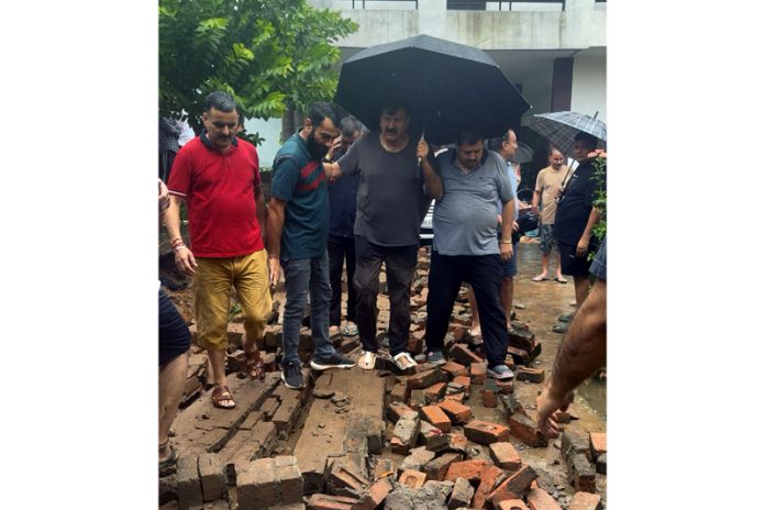 MLA Jammu West, Arvind Gupta during visit to flood hit areas in his constituency on Sunday.