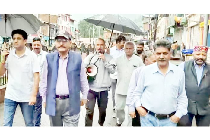 BJP activists during a protest demonstration in Bhaderwah on Sunday. -Excelsior/Tilak Raj