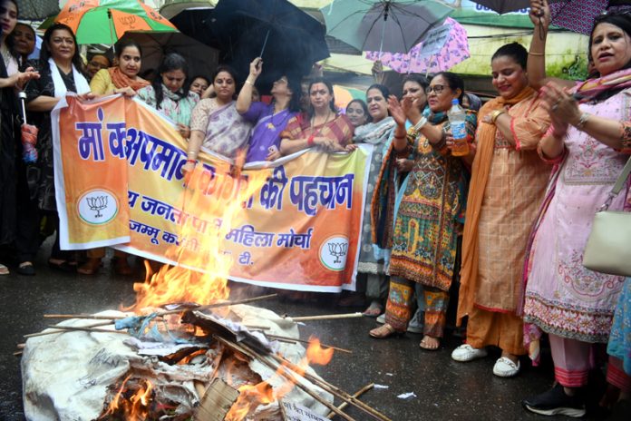 BJP Mahila Morcha activists protesting at Jammu against Congress. -Excelsior/Rakesh