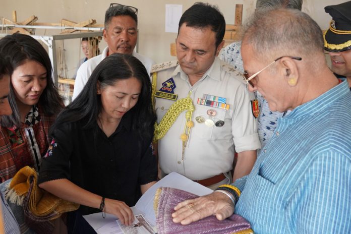 LG Ladakh Kavinder Gupta along with officials at a Pashmina weaving unit in Industrial Estate, Leh. LG Ladakh Kavinder Gupta along with officials at a Pashmina weaving unit in Industrial Estate, Leh.