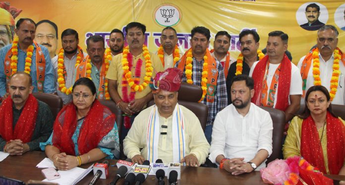 BJP president, Sat Sharma addressing a press conference at Jammu along with other party leaders on Thursday. BJP president, Sat Sharma addressing a press conference at Jammu along with other party leaders on Thursday.