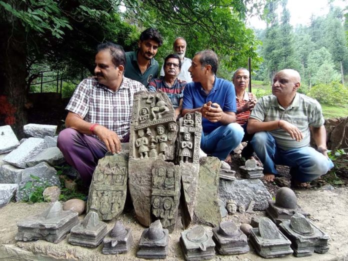 Ancient idols and Shivlings which were found at Karkut Nag Shrine in Salia Anantnag during excavation. -Excelsior/Sajad Dar