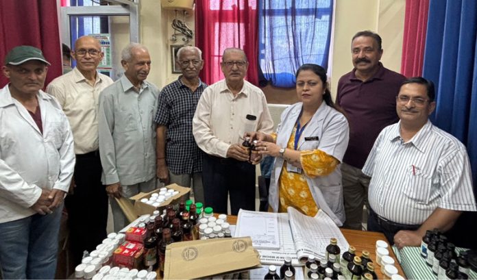 Management Committee members of SVMMCH Ambphalla and others during a medical camp in Jammu on Thursday.