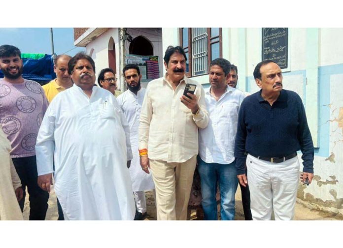 Congress leaders visiting flood affected areas in Jammu City on Friday.