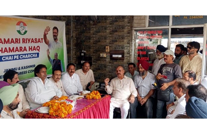 Cong leaders led by Raman Bhalla interacting with Taxi Union members in Jammu. Cong leaders led by Raman Bhalla interacting with Taxi Union members in Jammu.