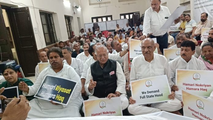 Senior Cong leaders and workers sitting on hunger strike in Jammu on Thursday.