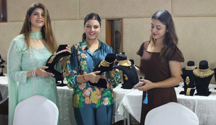 Customers busy in selecting new jewellery collection in Jammu. -Excelsior/Rakesh