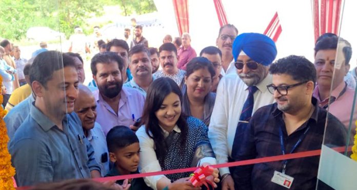 BJYM leader, Devyani Rana inaugurating new branch of ICICI Bank in Dammi village near Nagrota on Tuesday.